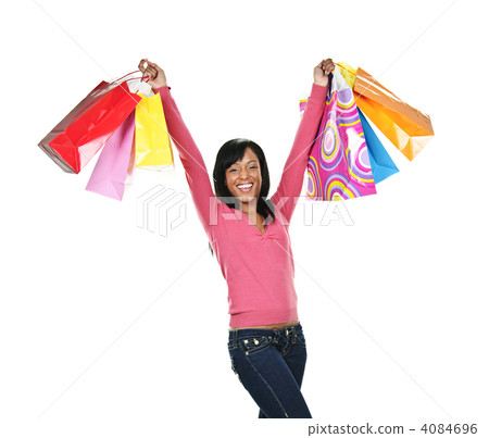 Excited young black woman with shopping bags 4084696