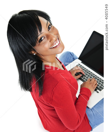 Young black woman using laptop computer 4085549