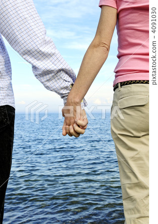 Couple holding hands Couple holding hands 4091030