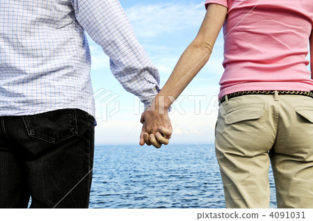 Couple holding hands Couple holding hands 4091031