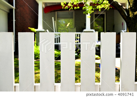 Front yard with white fence 4091741