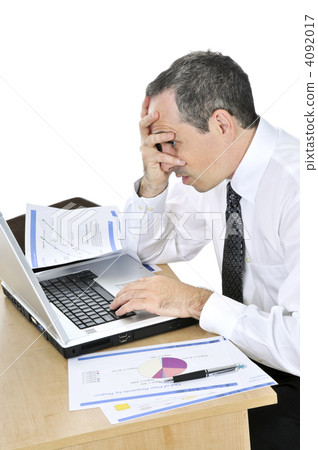 Businessman at his desk on white background Businessman at his desk on white background 4092017