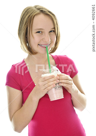 Teenage girl with milkshake 4092661