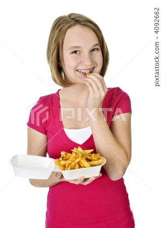Teenage girl with french fries 4092662