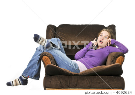 Teenage girl talking on a phone Teenage girl talking on a phone 4092684