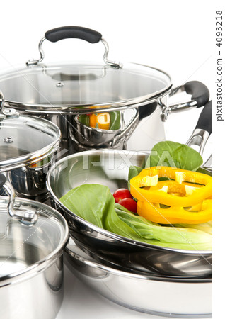 Stainless steel pots and pans with vegetables Stainless steel pots and pans with vegetables 4093218