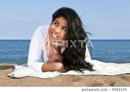 Young native american woman at beach 4093545