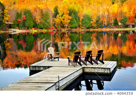 Wooden dock on autumn lake 4094359