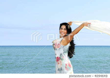 Beautiful young woman at beach Beautiful young woman at beach 4094649