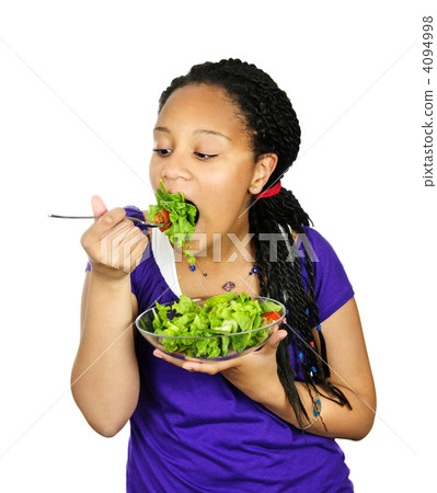 Girl having salad 4094998
