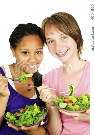 Girls having salad 4094999