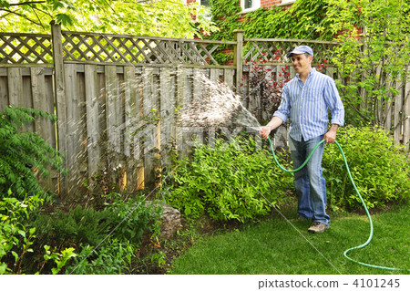 Man watering garden Man watering garden 4101245