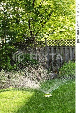 Lawn sprinkler watering grass 4101247