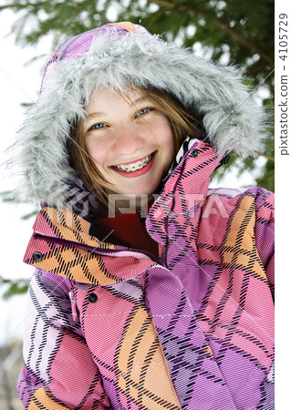 Happy winter girl in ski jacket Happy winter girl in ski jacket 4105729