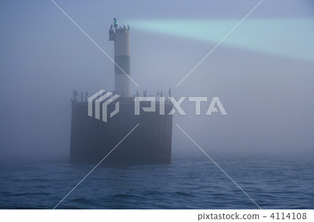 Lighthouse in fog Lighthouse in fog 4114108