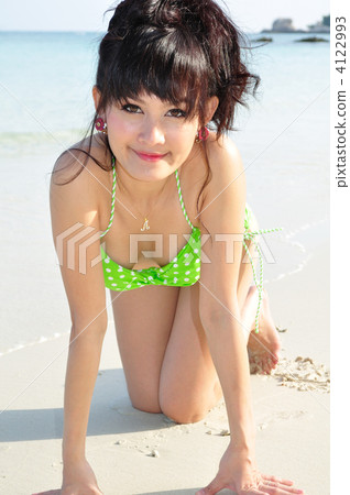 A young woman in bikini enjoying Koh Samet resort 4122993