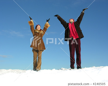 couple with hands up. winter 4140505