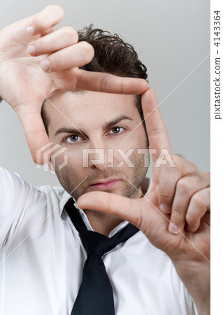 man forming frame with fingers man forming frame with fingers 4143364