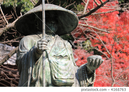 Shikoku Shrine Plant No. 71 Buddhist 'Yataiji' Statue and the autumn leaves 4168763