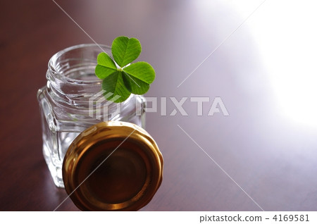 Four leaves in an empty bottle 4169581