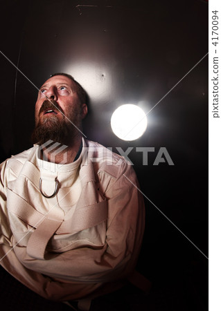 Crazy person in a straitjacket 4170094