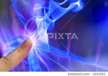 A finger touching the plasma ball A finger touching the plasma ball 4201905