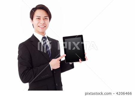 A businessman showing an iPad 4206466