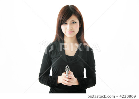 A woman turning his gun A woman turning his gun 4220909