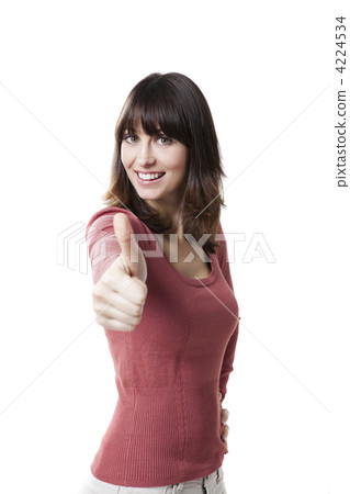 Beautiful woman with thumbs up 4224534