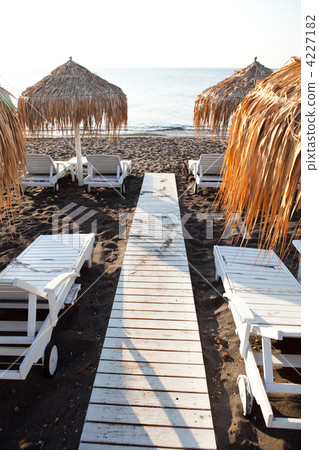 Sunbeds in Perissa, Santorini, Greece Sunbeds in Perissa, Santorini, Greece 4227182