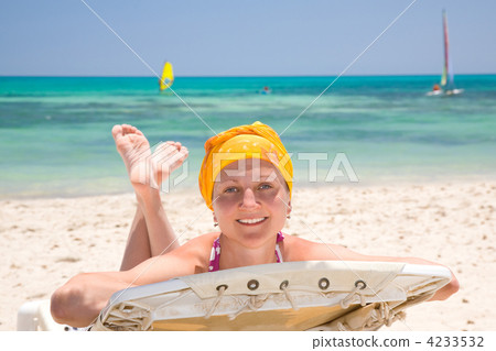young woman on the beach bed young woman on the beach bed 4233532