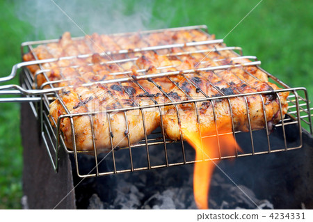 grilled chicken in barbecue grate 4234331