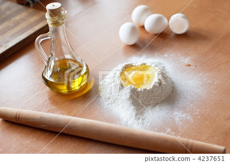 Egg in a pile of flour Egg in a pile of flour 4237651