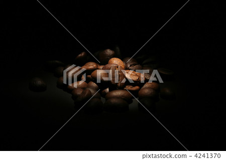 heap of coffee beans on black background 4241370