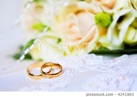 wedding rings with bouquet 4241863