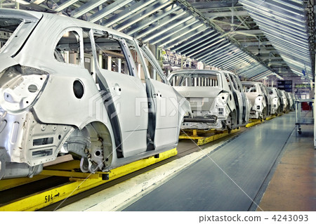 cars in a row at car plant cars in a row at car plant 4243093