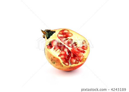 half of pomegranate on white bacjground half of pomegranate on white bacjground 4243189