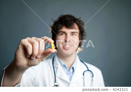 Doctor with a pill 4243321