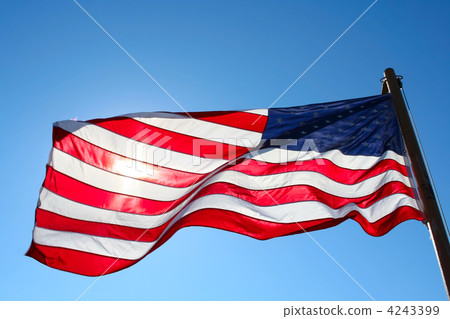 american flag backlit from the sun 4243399