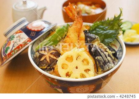 Bowl of rice and fried fish 4248745