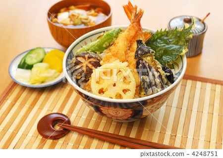 Bowl of rice and fried fish 4248751