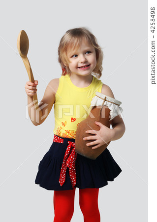 Little girl with a wooden spoon and crock Little girl with a wooden spoon and crock 4258498