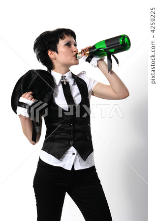 Bride drinking from a bottle of champagne Bride drinking from a bottle of champagne 4259225