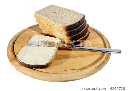 Bread butter a knife on the white background Bread butter a knife on the white background 4260728