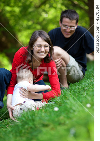Happy family of three having fun together Happy family of three having fun together 4270394