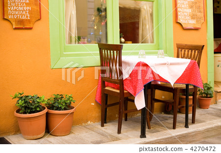 Beautiful street cafe in greek town Nafplion at Peloponnese peni 4270472