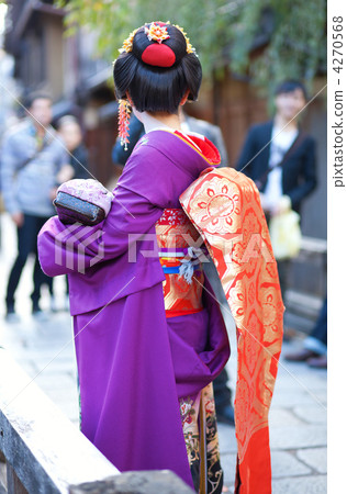 Young Maiko on a street of Gion, Kyoto, Japan 4270568