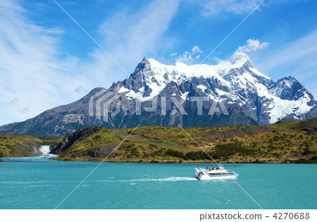 Scenic view of Pehoe lake and Salto Grande waterfall in Torres d Scenic view of Pehoe lake and Salto Grande waterfall in Torres d 4270688