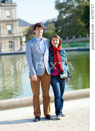 Happy couple in the Luxembourg garden in Paris Happy couple in the Luxembourg garden in Paris 4270717