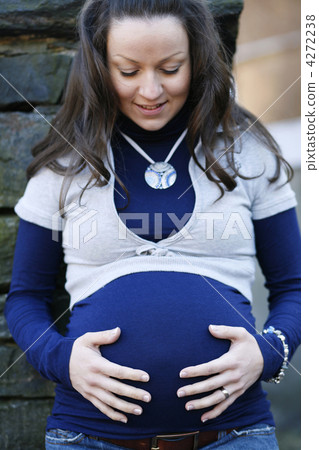 Happy young pregnant woman outdoors. 4272238